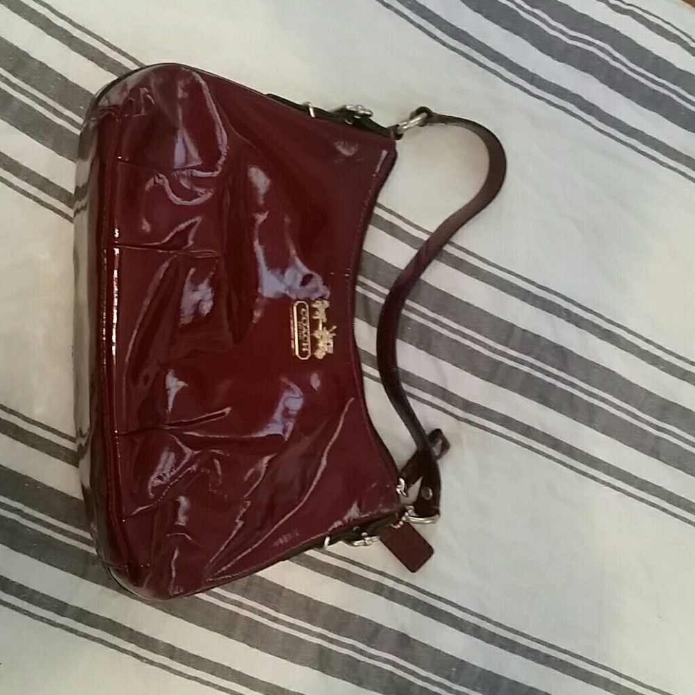 Small deep red coach purse